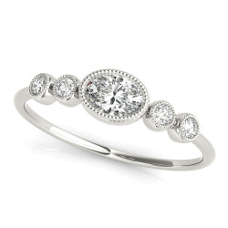 5 STONE FASHION RING OVAL CENTER